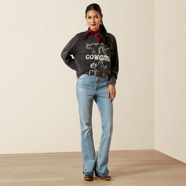 Model wearing Ariat Canvas Women’s Oversized T-Shirt styled with jeans