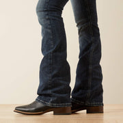 Esti Boot Cut Jeans styled over cowboy boots for riding