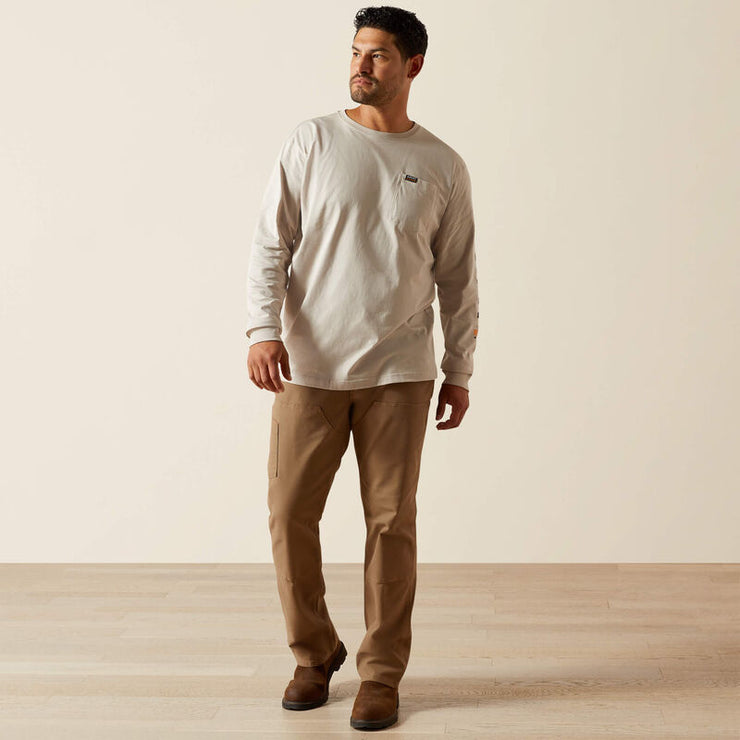 Model wearing Ariat Rebar Cotton Strong Standard Pocket T-Shirt in Beige