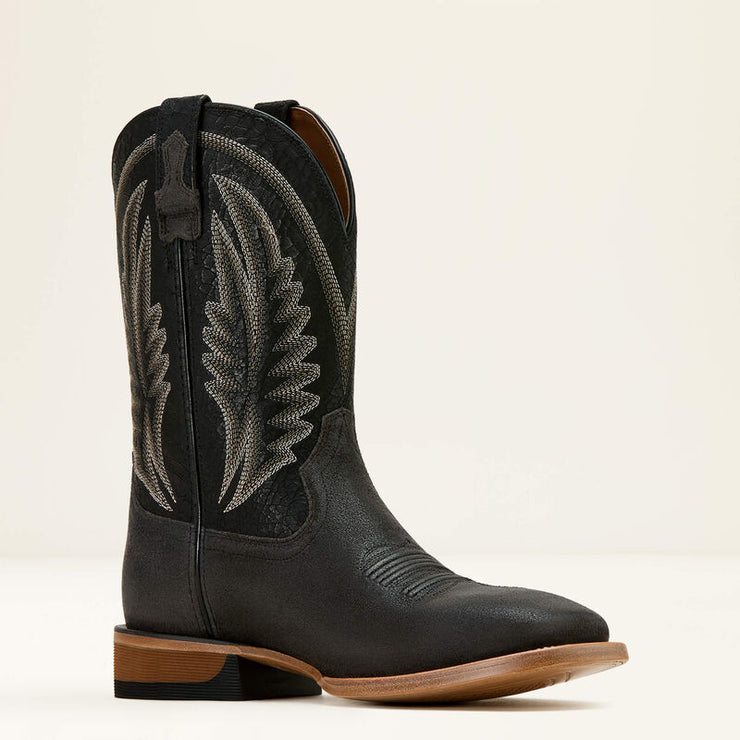 Lifestyle shot of ARIAT Sidewinder cowboy work boots for men worn outdoors