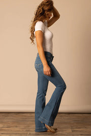 Lola Soho Fade Mid-Rise Jeans styled with cowgirl boots