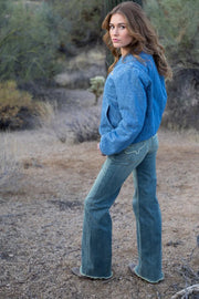 Olivia High Rise Jeans styled with cowgirl boots